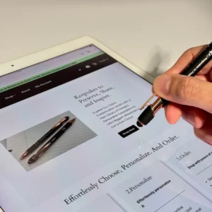 Personalized Metal Pen with custom engraving and built-in stylus, featuring sleek black design with rose gold accents