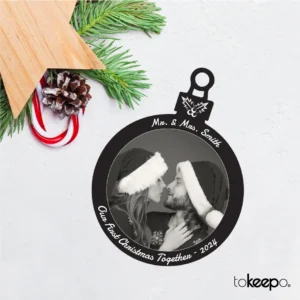 Personalized black acrylic Christmas ornament with white laser engraving, featuring custom designs and text, measuring 100x75 mm (4x3 inches).