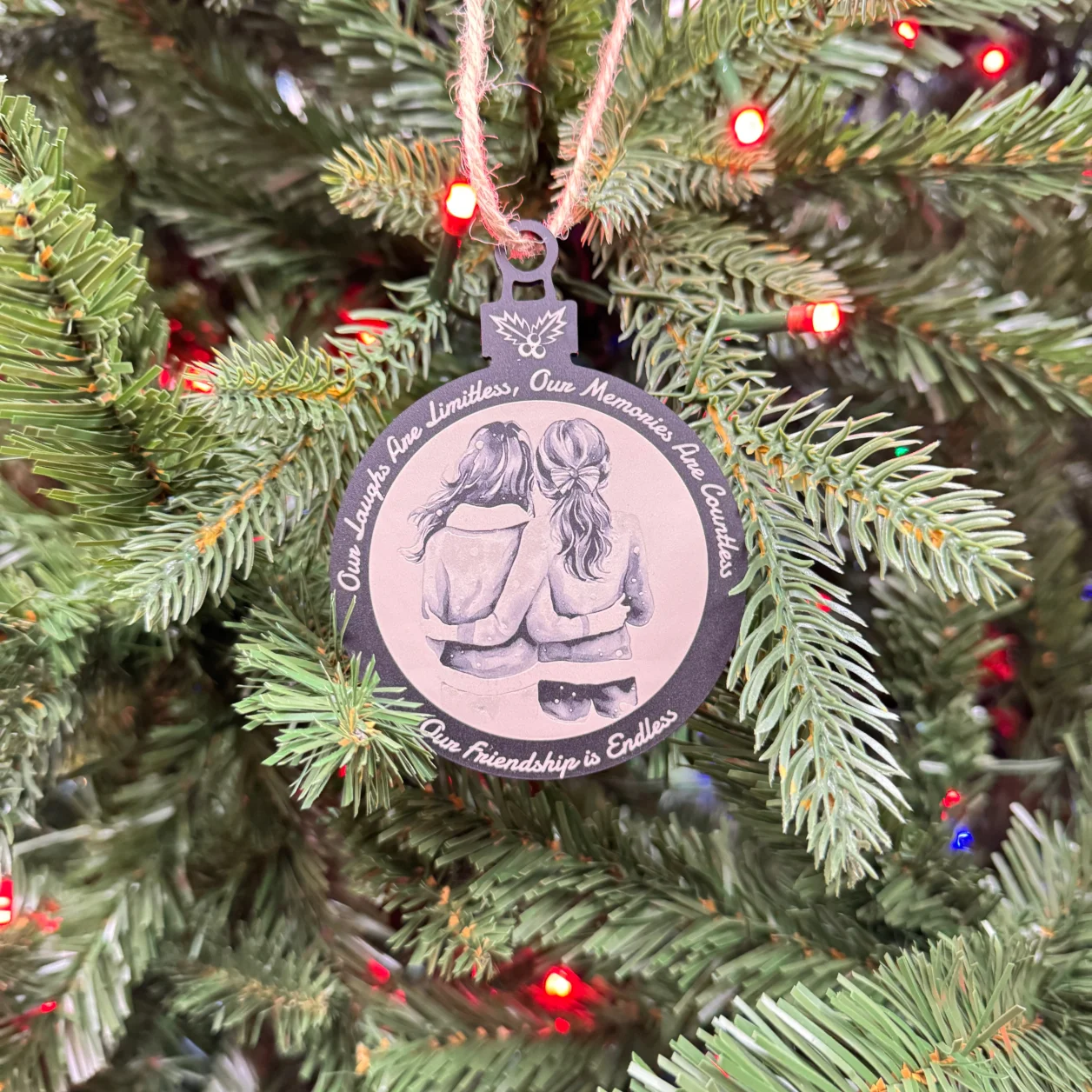 Personalized black acrylic Christmas ornament with white laser engraving, featuring custom designs and text, measuring 100x75 mm (4x3 inches).