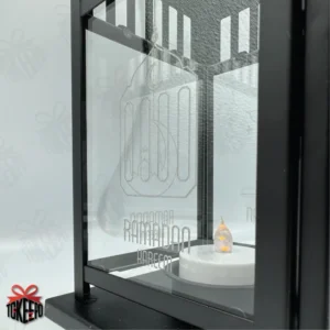 Personalized black steel and glass Ramadan lantern with Arabic calligraphy engraving on the front panel by tokeepo.