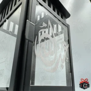 Personalized black steel and glass Ramadan lantern with Arabic calligraphy engraving on the front panel by tokeepo.